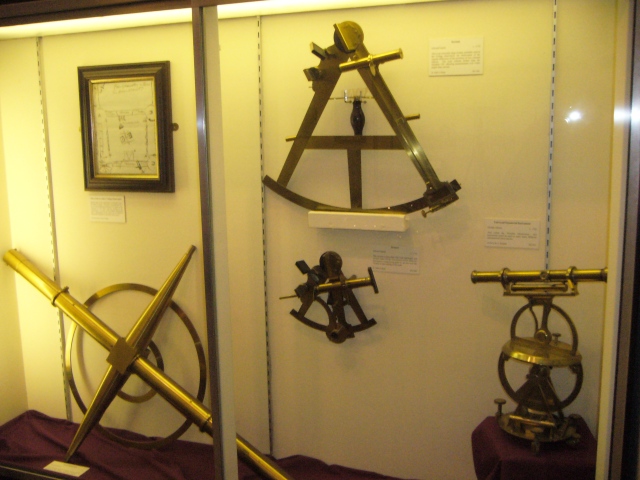 A style of display I was trying to get away from: isolated historic glass and brass instruments